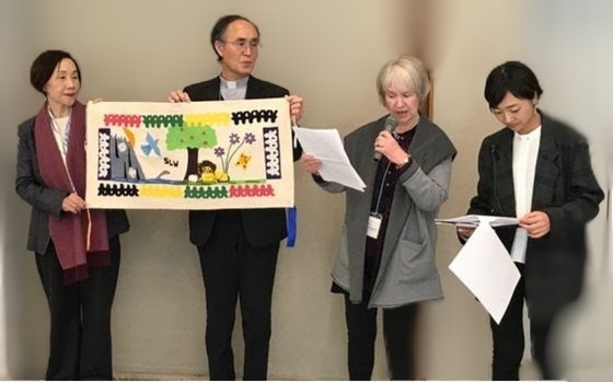 Bishop of Hiroshima Receives Ribbon