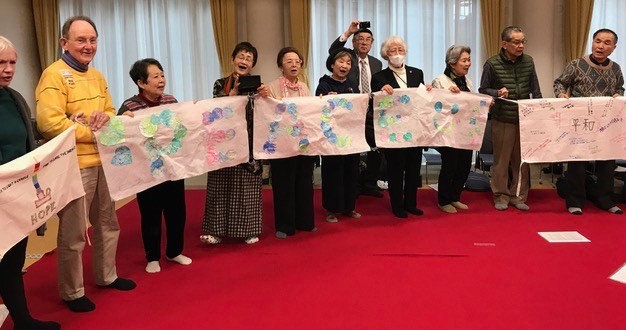 Ribbon joining in Kyoto with panels from Japan and US, Interfaith Prayer for Peace was read.